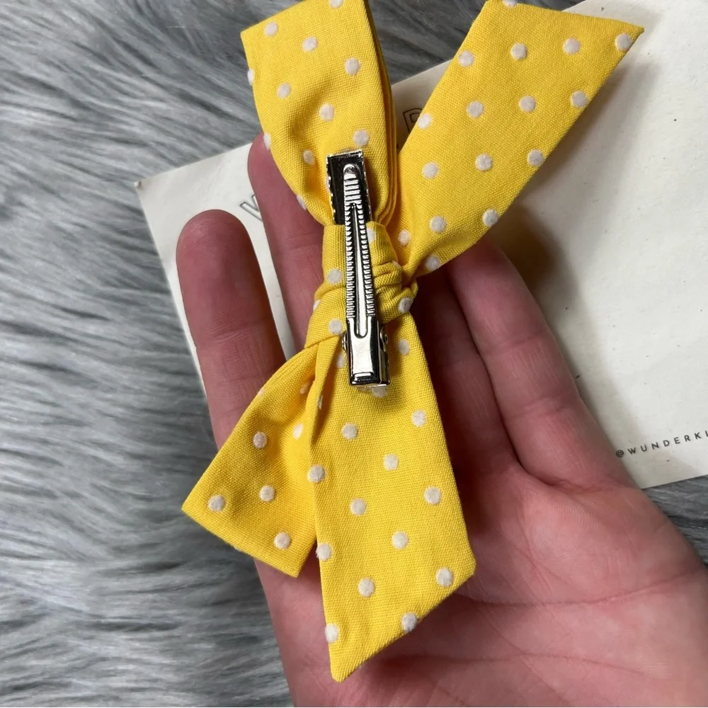 Wunderkin yellow Swiss dot bow clip